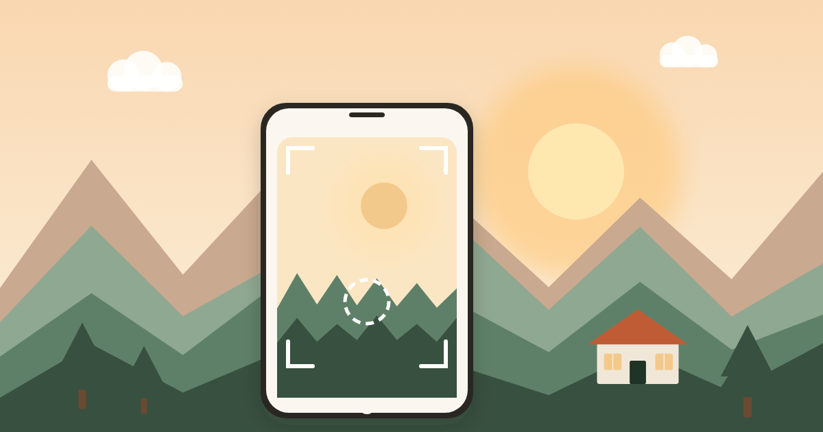 A phone framing a sunrise over the mountains above a homestay